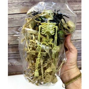 Bag of Vintage Skeleton toys body and head pieces